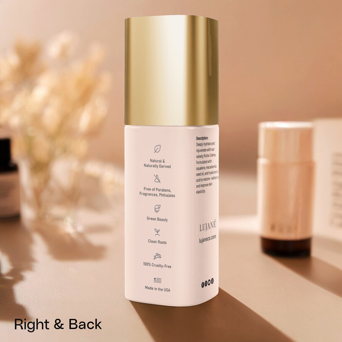 A detailed view of the LUJANÉ Revitalizing Crème gold-capped bottle, showcasing the velvety Riche Crème formula with squalane and hyaluronic acid designed to restore radiance and improve skin elasticity.