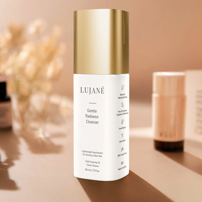 LUJANÉ Gentle Radiance Cleanser in a luxury lifestyle setting; a daily foaming oil facial cleanser designed to provide lightweight nourishment for glowing, silken skin.