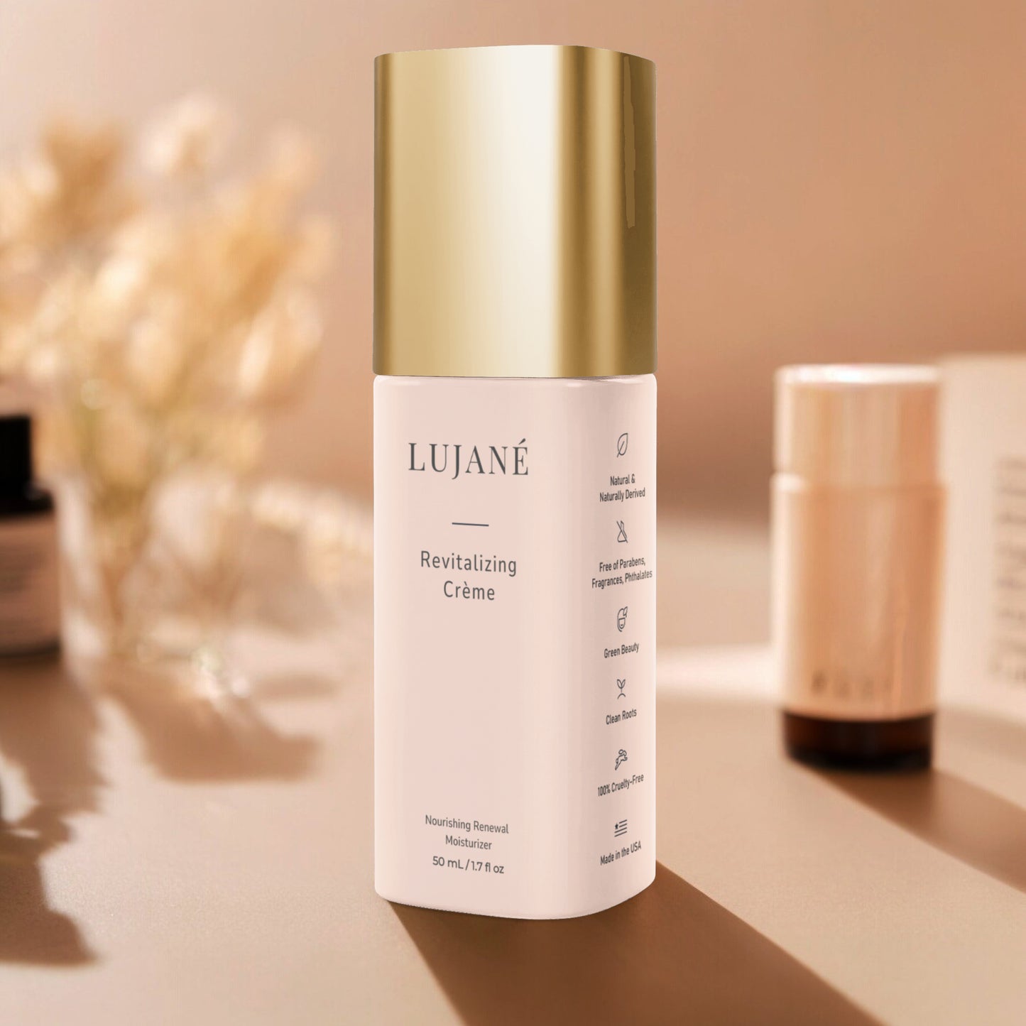 LUJANÉ Revitalizing Crème in a premium gold-capped bottle: a nourishing renewal moisturizer with squalane and hyaluronic acid designed to restore radiance and improve skin elasticity.