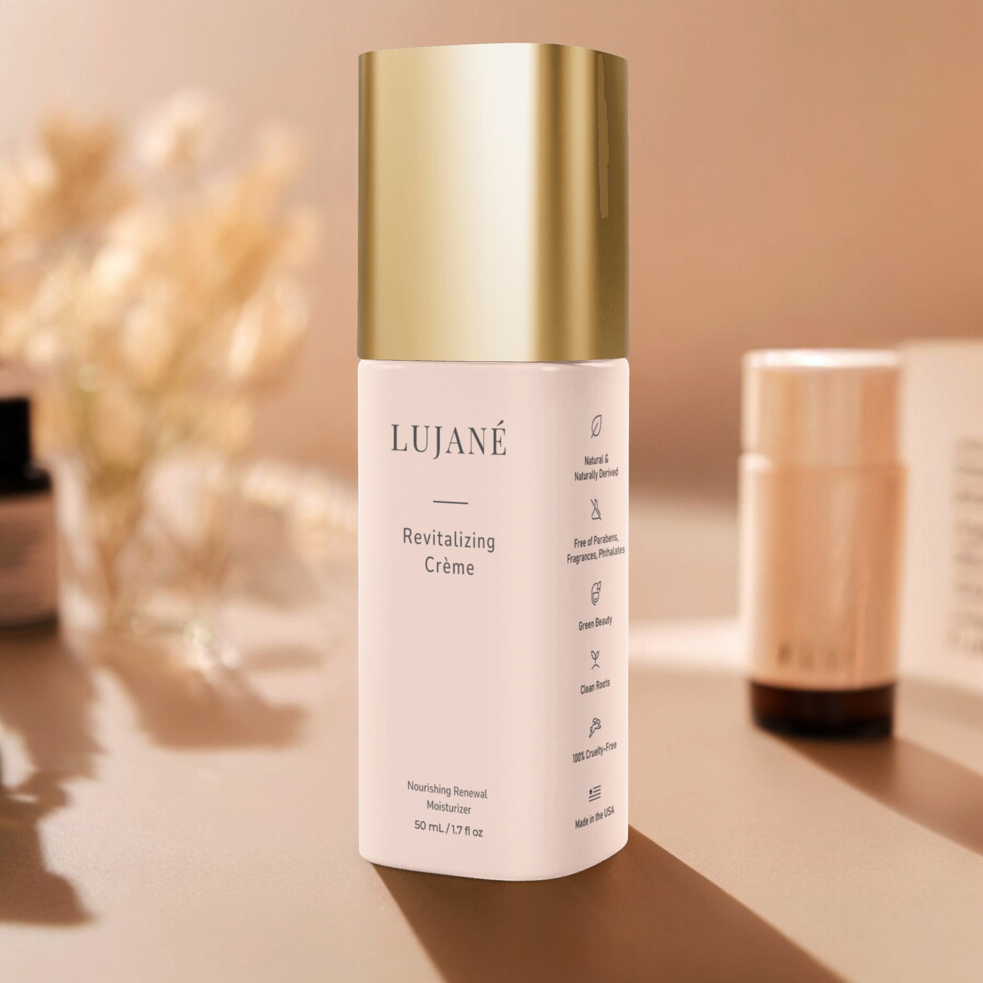 LUJANÉ Revitalizing Crème in a premium gold-capped bottle: a nourishing renewal moisturizer with squalane and hyaluronic acid designed to restore radiance and improve skin elasticity.
