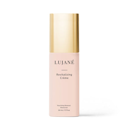 LUJANÉ Revitalizing Crème in a premium gold-capped bottle, a nourishing renewal moisturizer designed to restore skin elasticity and provide deep, long-lasting hydration for a radiant look.