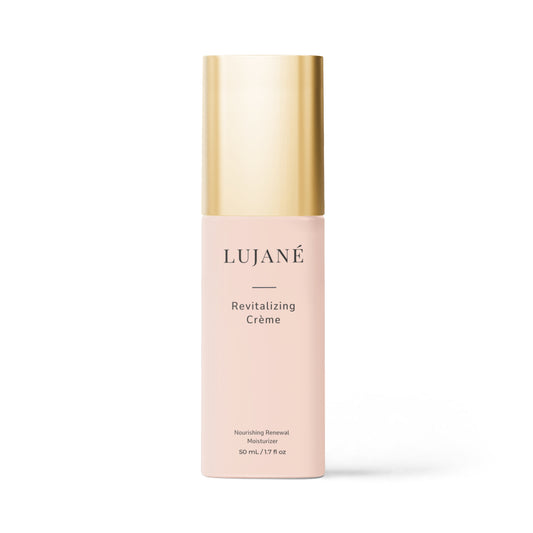 LUJANÉ Revitalizing Crème in a premium gold-capped bottle, a nourishing renewal moisturizer designed to restore skin elasticity and provide deep, long-lasting hydration for a radiant look.